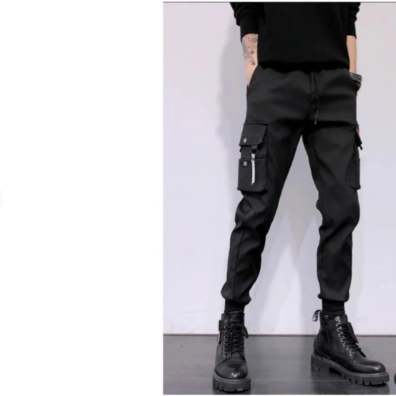 2025 nouveau pantalon de couleur unie à la mode multi-poche à rabat pantalon Cargo pour hommes pantalon d'extérieur ample décontracté pantalon de travail masculin surdimensionné Camara Shopping 2025 nouveau pantalon de couleur unie à la mode multi-poche à rabat pantalon Cargo pour hommes pantalon d'extérieur ample décontracté pantalon de travail masculin surdimensionné