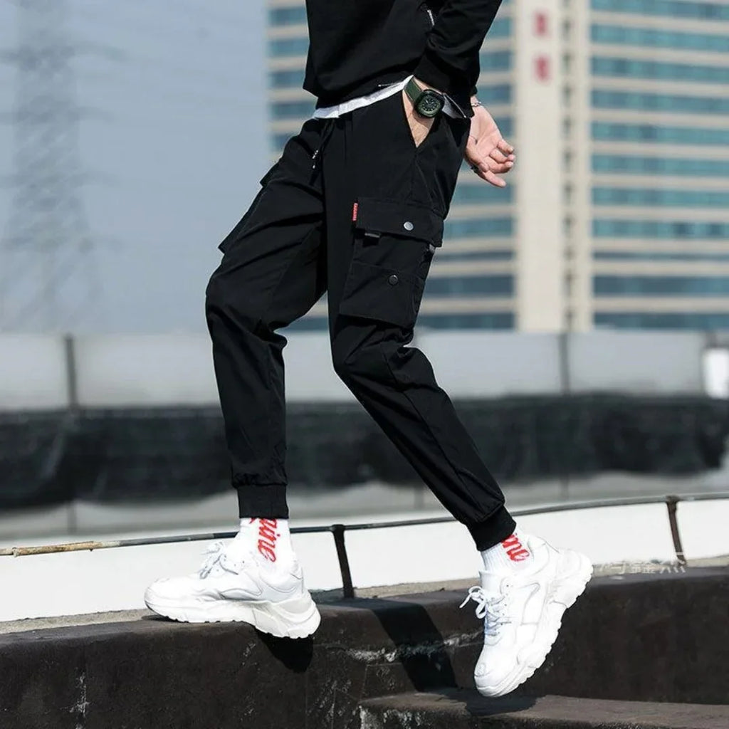 2025 nouveau pantalon de couleur unie à la mode multi-poche à rabat pantalon Cargo pour hommes pantalon d'extérieur ample décontracté pantalon de travail masculin surdimensionné Camara Shopping 2025 nouveau pantalon de couleur unie à la mode multi-poche à rabat pantalon Cargo pour hommes pantalon d'extérieur ample décontracté pantalon de travail masculin surdimensionné