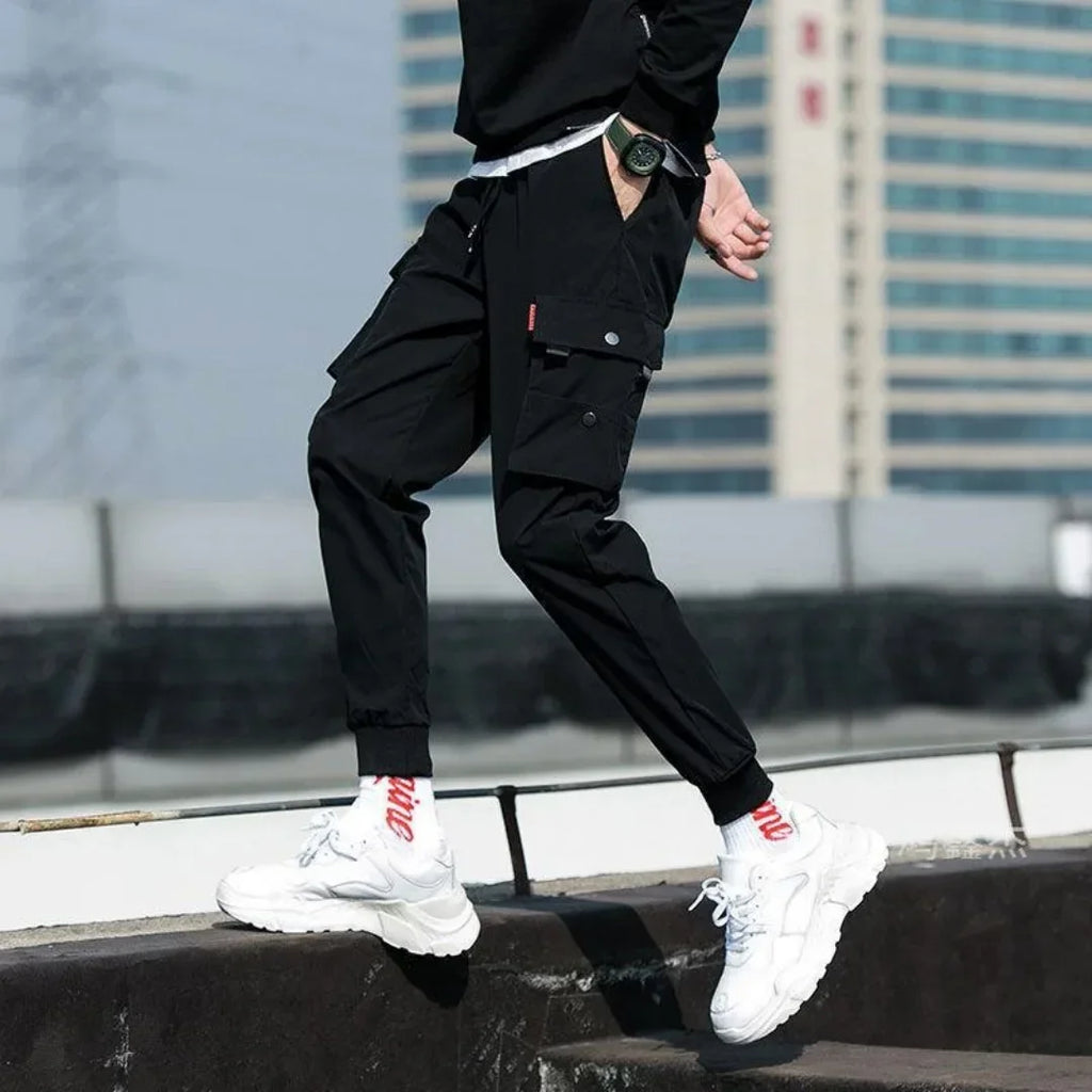 2025 nouveau pantalon de couleur unie à la mode multi-poche à rabat pantalon Cargo pour hommes pantalon d'extérieur ample décontracté pantalon de travail masculin surdimensionné Camara Shopping 2025 nouveau pantalon de couleur unie à la mode multi-poche à rabat pantalon Cargo pour hommes pantalon d'extérieur ample décontracté pantalon de travail masculin surdimensionné