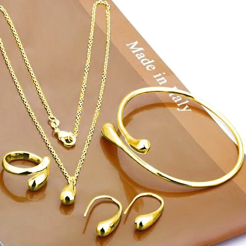 Mode S925 argent aiguille boucles d'oreilles bague Bracelet ensemble Simple personnalité femmes goutte d'eau quatre pièces ensemble de bijoux pour les femmes cadeau Camara Shopping Mode S925 argent aiguille boucles d'oreilles bague Bracelet ensemble Simple personnalité femmes goutte d'eau quatre pièces ensemble de bijoux pour les femmes cadeau