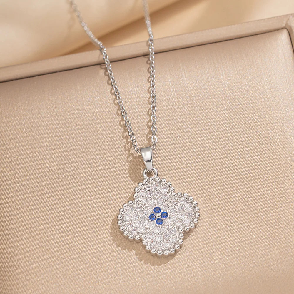 LENNIK Premium Lucky Clover luxe complet Zircon Micro pavé boucles d'oreilles collier bague ensemble, polyvalent pour le quotidien/fête, cadeau parfait Camara Shopping LENNIK Premium Lucky Clover luxe complet Zircon Micro pavé boucles d'oreilles collier bague ensemble, polyvalent pour le quotidien/fête, cadeau parfait