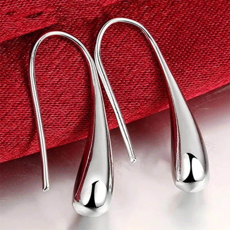 Mode S925 argent aiguille boucles d'oreilles bague Bracelet ensemble Simple personnalité femmes goutte d'eau quatre pièces ensemble de bijoux pour les femmes cadeau Camara Shopping Mode S925 argent aiguille boucles d'oreilles bague Bracelet ensemble Simple personnalité femmes goutte d'eau quatre pièces ensemble de bijoux pour les femmes cadeau